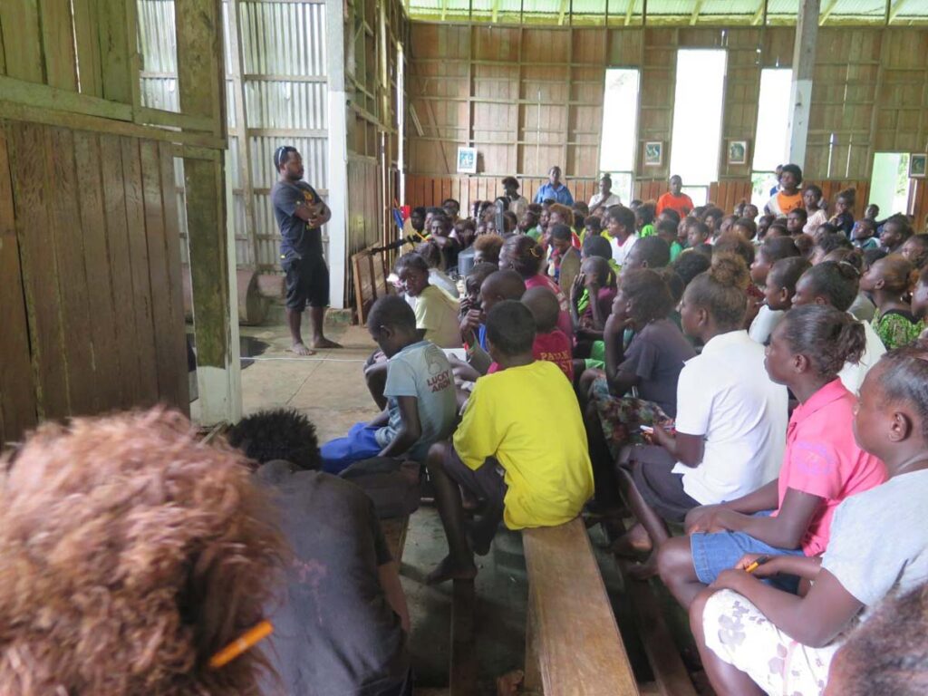 Enoch Rabi speaking in the Church in Gagan